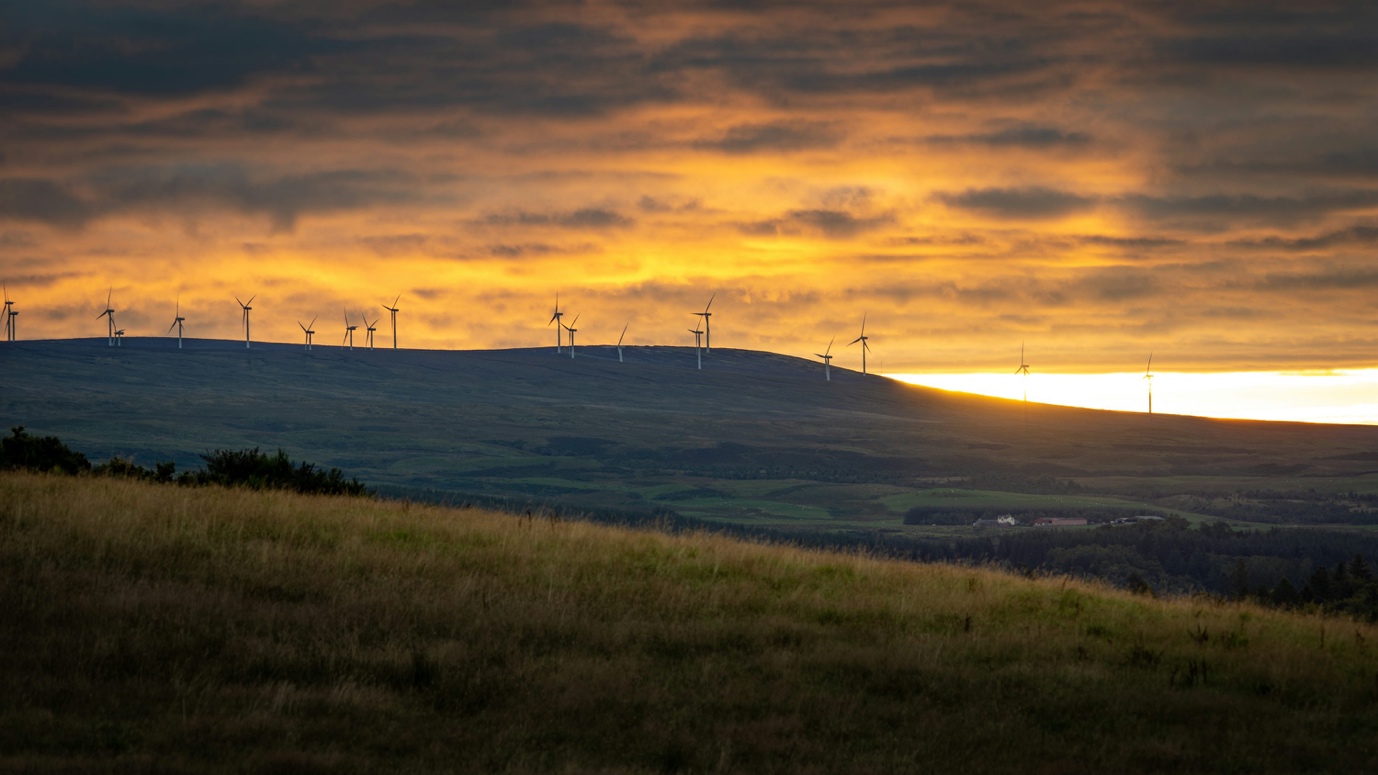 Wind turbines at sunset, Scotland